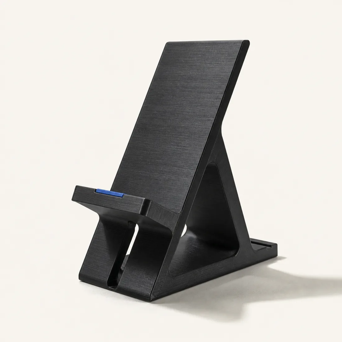 3D-printet mobilholder i mørk finish